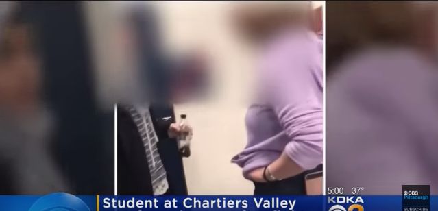 A screenshot from CBS-affiliate KDKA shows an apparent confrontation between two high school students in a bathroom.