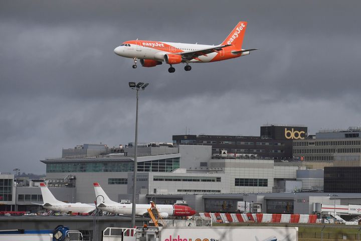 An easyJet plane descends towards Gatwick's runway on Friday after the airport reopened.