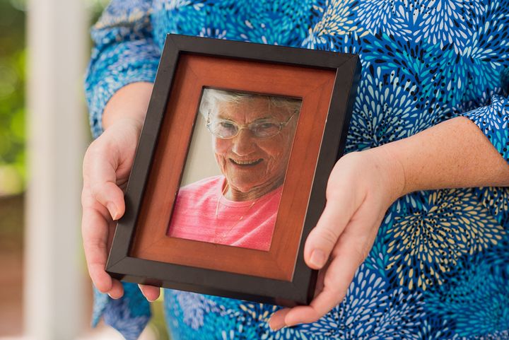Stephanie Weaver holds a photo of her grandmother, Bonnie Walker. Weaver is suing Brookdale Charleston for emotional distress following Walker’s death in a pond behind her assisted living facility in 2016.
