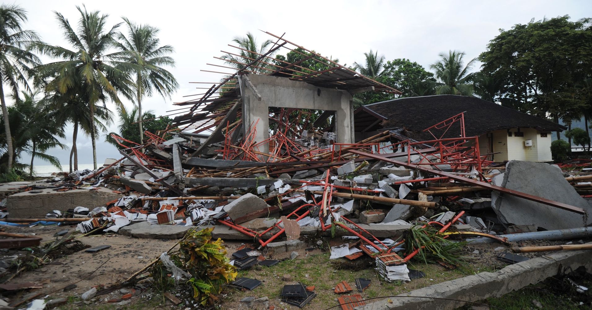 Rescuers Dig Through Rubble For Survivors After Indonesian Tsunami 