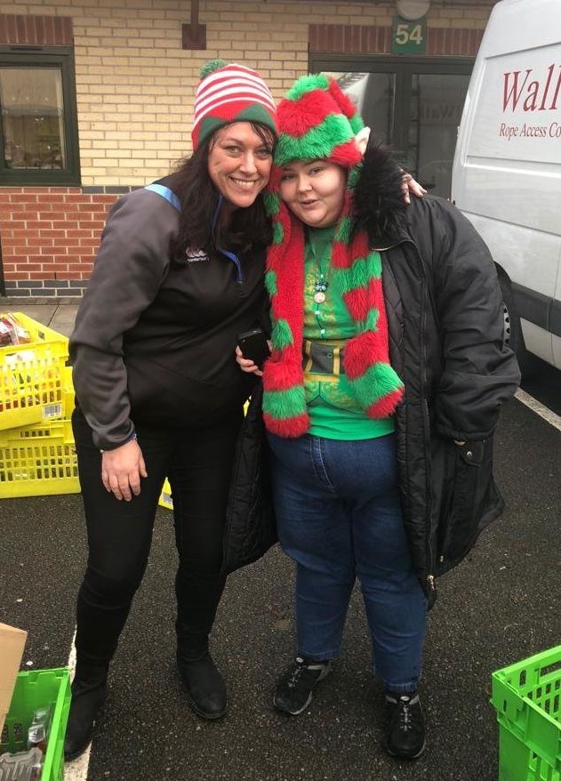 Volunteer Trisha and Bethany, who arrived to collect her hamper