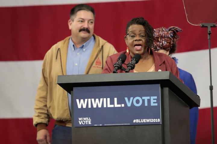Rep. Gwen Moore (D-Wis.), center, speaks at a rally for Wisconsin Democrats, including Randy Bryce (left), on Oct. 26 in Milwaukee. Progressive activists are pressing to have her appointed to the House Ways and Means Committee.