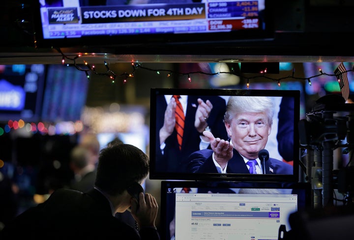 A picture of President Donald Trump is displayed on a computer on the floor of the New York Stock Exchange in New York, Monda