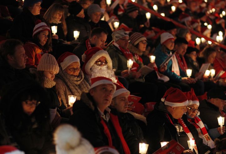 Fans of the FC Union football club gather in the club's stadium to sing Christmas carols in Berlin, Germany. The annual gathering has become a firm tradition now in its 16th year. 