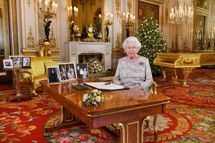 The Queen's Speech was recorded in Buckingham Palace’s White Drawing Room, surrounded by family photos