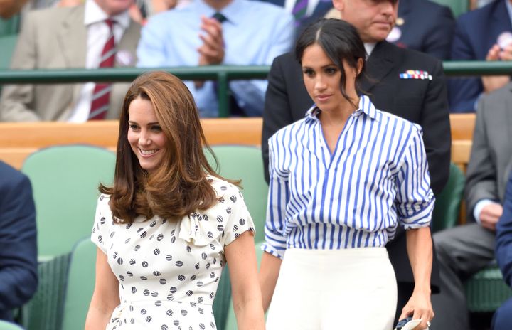Catherine, Duchess of Cambridge, and Meghan, Duchess of Sussex, attend the Wimbledon Tennis Championships on July 14 in London.