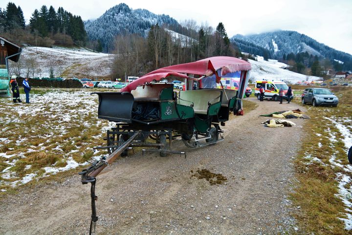 A damaged carriage sits on a path near Pfronten, southern Germany, after the Christmas Day collision 
