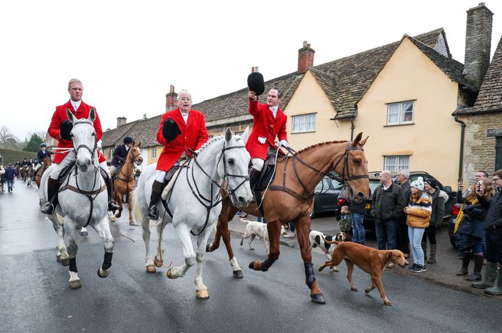 Members of the Avon Vale Hunt set off from the village of Lacock in Wiltshire for the annual Boxing Day hunt.