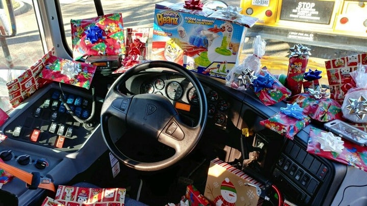 Curtis Jenkins, a bus driver for the Richardson Independent School District in Texas, packed his bus with Christmas presents for children at Lake Highlands Elementary School.