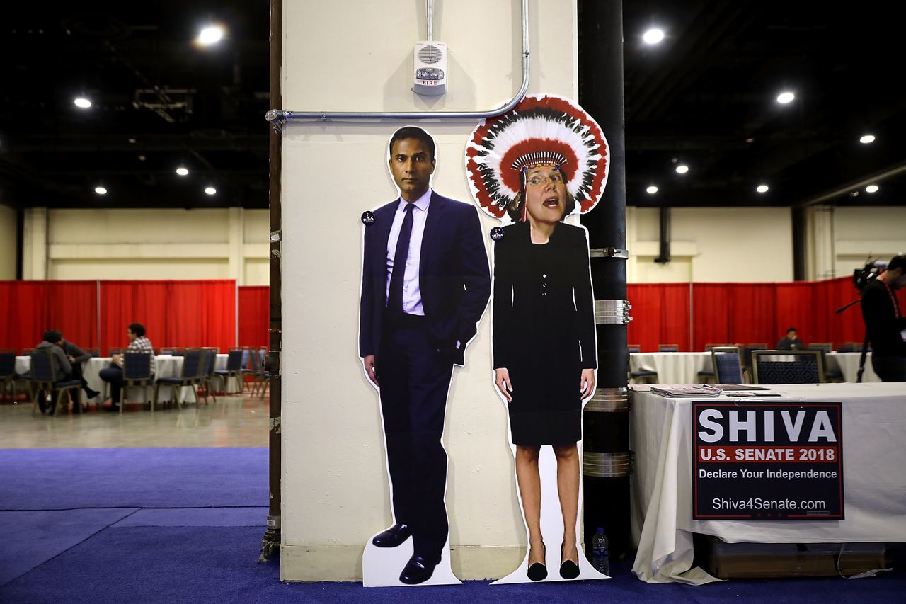 Shiva Ayyadurai, an independent who ran against Warren in 2018, set up this racist, photoshopped image of her wearing a Native American headdress at the Conservative Political Action Conference in National Harbor, Md. in February 2018.