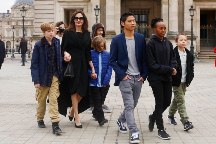 Angelina Jolie with her children Shiloh Pitt Jolie, Maddox Pitt Jolie, Vivienne Marcheline Pitt Jolie, Pax Thien Pitt Jolie, Zahara Marley Pitt Jolie, Knox Leon Pitt Jolie, visit the Louvre in Paris, France, on Jan. 30, 2017. 