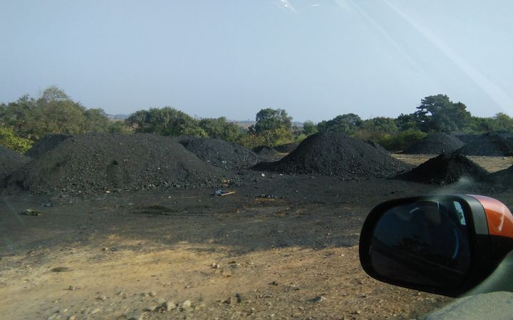 Coal mounds seen on the way to the site of disaster. The mine at Ksan, according to the families from Lumthari, has been active for two years. 