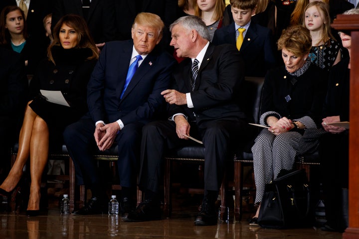 Melania Trump, Donald Trump and Franklin Graham during a ceremony honoring the late Billy Graham in the Rotunda of the U.S. C