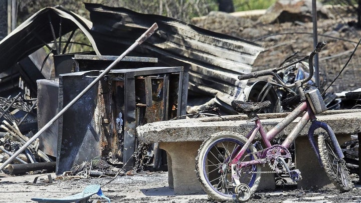 A home in El Jebel, Colorado, sits in ruins after being destroyed by a wildfire this summer. About half the state’s residents
