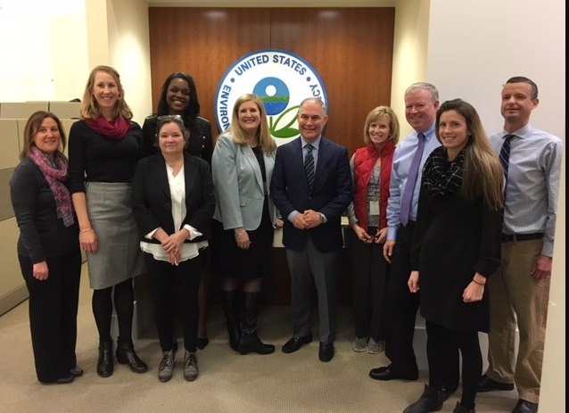 Alexandra Dunn, in the center, stands with former EPA Administrator Scott Pruitt on a regional office tour in February.