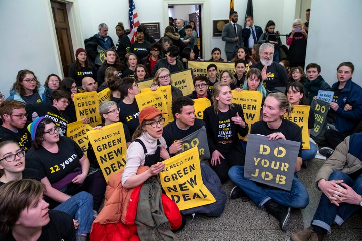 Protesters with the Sunrise Movement stage a sit-in in the office of Rep. Steny Hoyer, now the House majority leader, late last year to demand a Green New Deal.