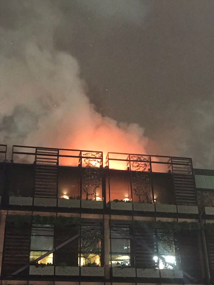The blaze appeared to be close to The Ivy's roof garden, described as having 'roaring fire pits'.