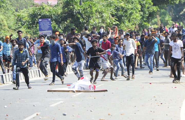 Protesters throw stones at police in Palakkad on 3 January. The large-scale violence the BJP unleashed in Kerala after two women entered Sabarimala has left it on the back foot.