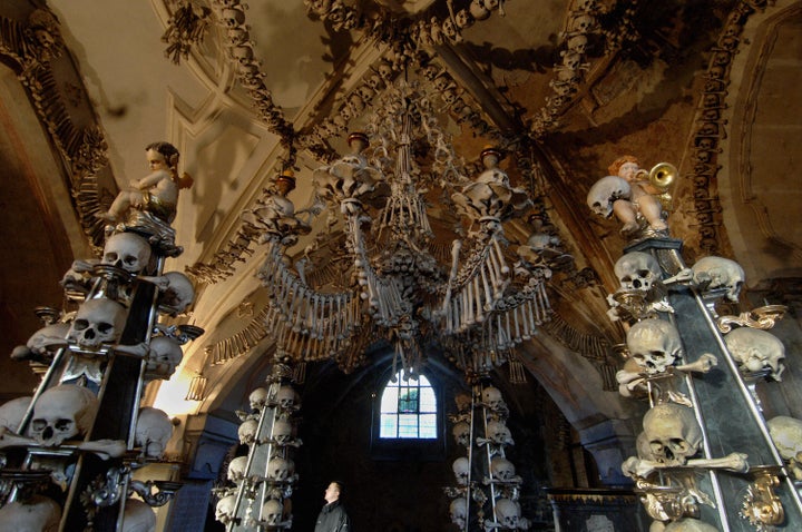  A bone-chandelier hanging over 4 Gothic pinnacles in the Sedlec Ossuary, beneath the Cemetery Church of All Saints in Sedlec, about 75 km east of Prague, 14 January 2007. 