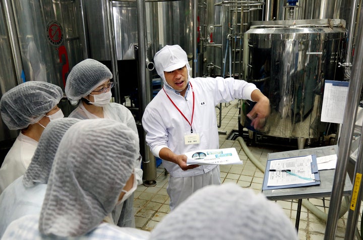 Seikatsu Club members visit the factory where the cooperative is developing its own yogurt.