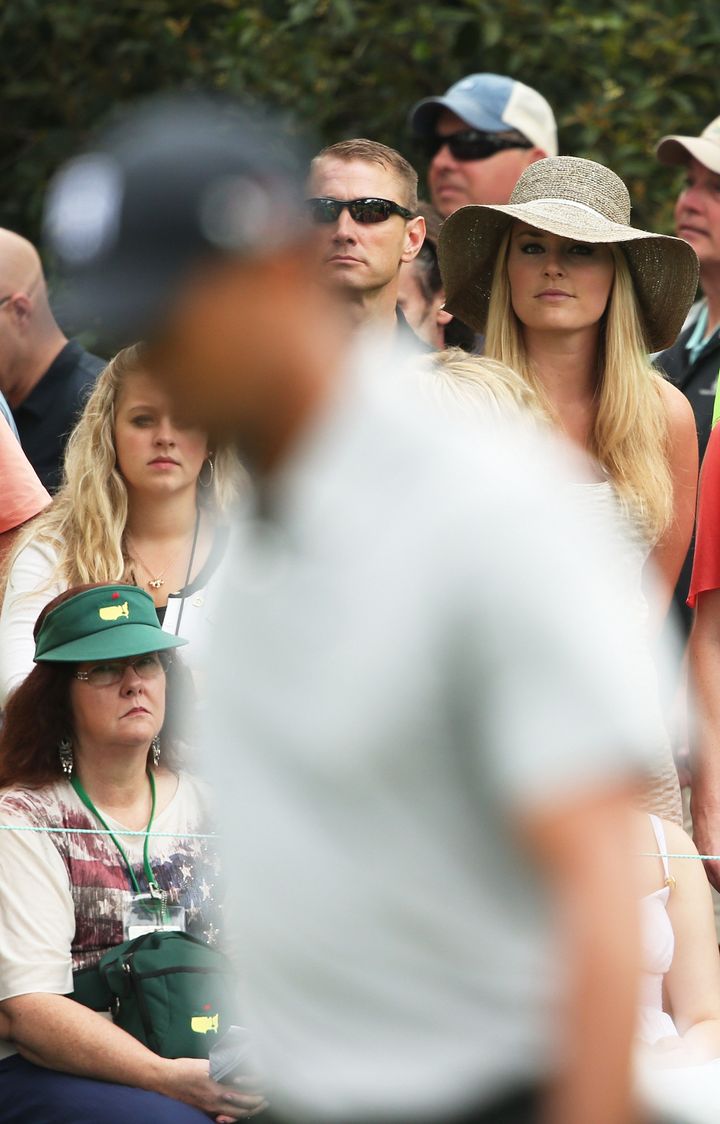 AUGUSTA, GA - APRIL 11: Skier Lindsey Vonn watches as boyfriend Tiger Woods of the United States plays the first hole during the first round of the 2013 Masters Tournament at Augusta National Golf Club on April 11, 2013 in Augusta, Georgia. (Photo by Andrew Redington/Getty Images)