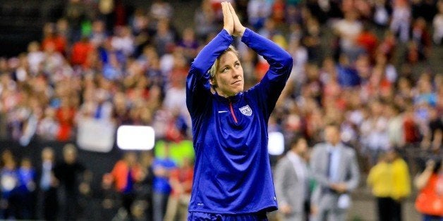 Dec 16, 2015; New Orleans, LA, USA; United States of America forward Abby Wambach (20) salutes fans as she walks off the fie