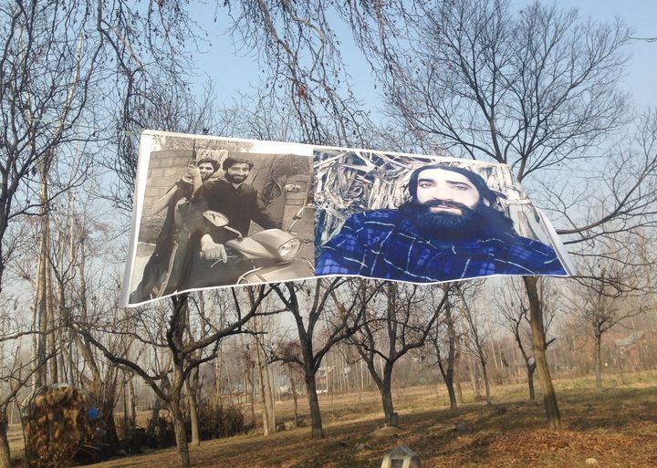 A poster of Zahoor Thokar, a slain militant, outside his village in Kashmir. Thokar, a former member of the 173rd territorial Army, who defected to the Hizbul Mujahideen in Kashmir in 2016.