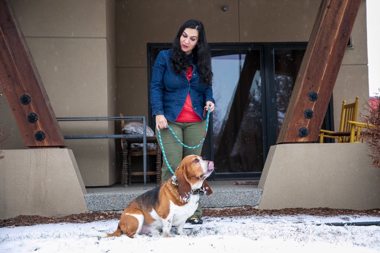 Nina Kouprianova takes her basset hound, Rody, out in Whitefish, Montana.