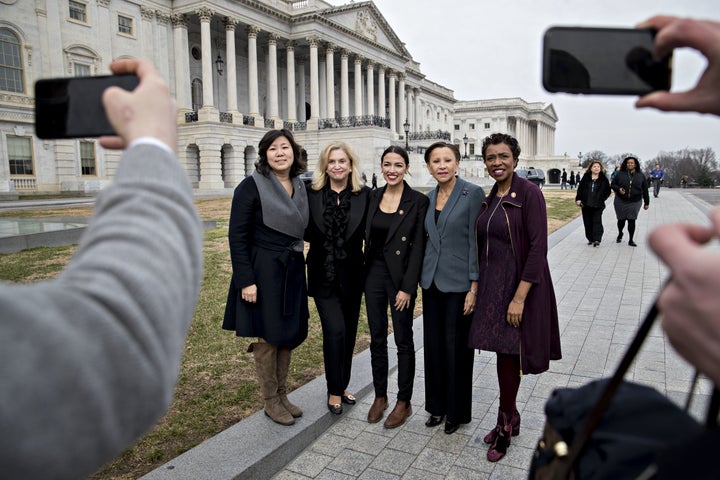 (Left to right) New York Reps. Grace Meng, Carolyn Maloney, Alexandria Ocasio-Cortez, Nydia Velazquez and Yvette Clark, all Democrats, pose for a photograph as Congress convened earlier this month. Ocasio-Cortez, the sole new lawmaker among the group, has proved a magnet for publicity.