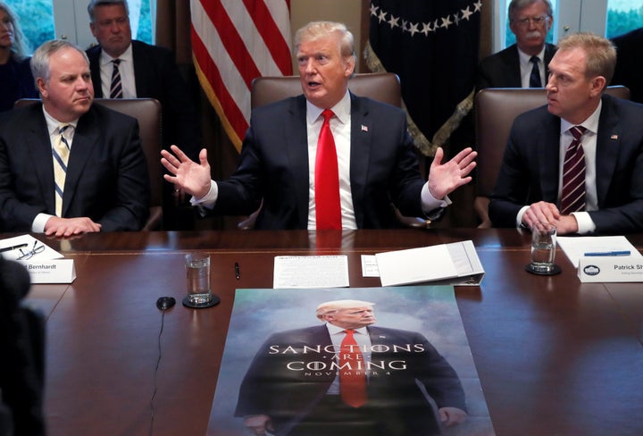 Acting Secretary of the Interior David Bernhardt (left), President Donald Trump and acting Defense Secretary Patrick Shanahan
