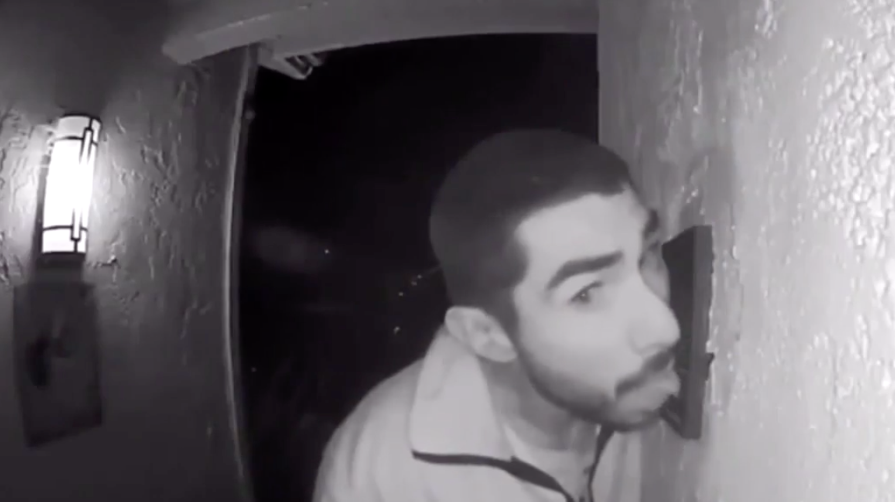 Security Camera Grabbing Security Camera Catches Prowling Suspect Licking Doorbell For 3 Hours ...