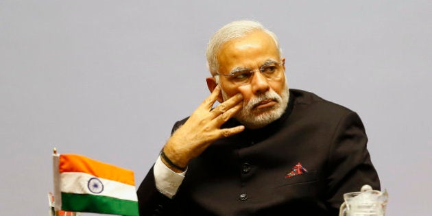 Indian Prime Minister Narendra Modi attends the 18th summit of the South Asian Association for Regional Cooperation (SAARC) in Katmandu, Nepal, Wednesday, Nov. 26, 2014. The South Asian Association for Regional Cooperation summit, the first since 2011, is meant as a forum to discuss regional issues, but is usually dominated by the rivalry between Pakistan and India. (AP Photo/Narendra Shrestha, Pool)