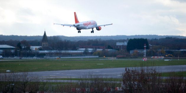An Easyjet plane lands at Gatwick Airport in southern England on December 7, 2013. A 'technical problem' in Britain's air traffic control systems caused widespread flight delays and cancellations across the country's airspace. AFP PHOTO/CARL COURT (Photo credit should read CARL COURT/AFP/Getty Images)