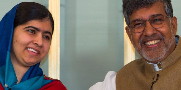 OSLO, NORWAY - DECEMBER 09: Malala Yousafzai and Kailash Satyarthi attends the Nobel Peace Prize press conference at the Norwegian Nobel Institute on December 9, 2014 in Oslo, Norway. (Photo by Nigel Waldron/Getty Images)