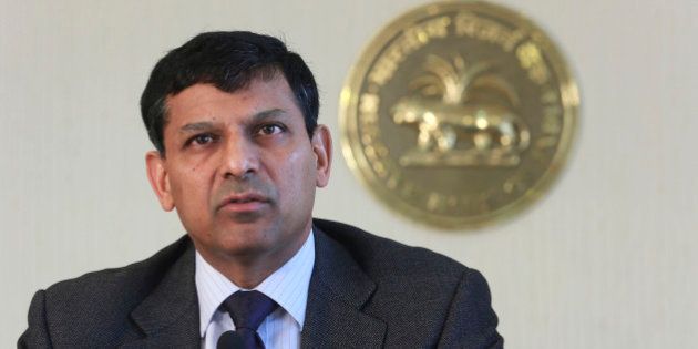 Reserve Bank of India (RBI) Governor Raghuram Rajan announces the first bimonthly monetary policy statement at the RBI headquarters in Mumbai, India, Tuesday, April 1, 2014. Rajan announced Tuesday that the key policy rate will remain unchanged since retail inflation still remains