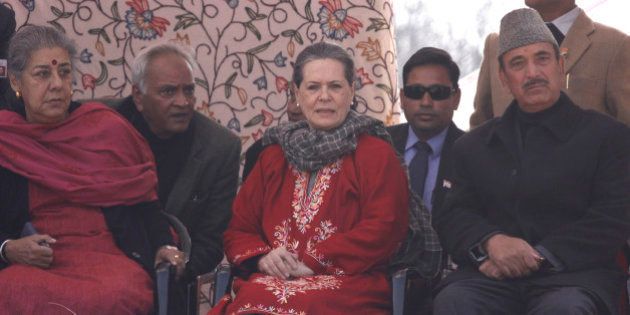 SRINAGAR, INDIA - DECEMBER 10: Congress President Sonia Gandhi along with former Union Ministers Ghulam Nabi Azad and Ambika Soni during an election rally at Roni Pora Sangus constituency on December 10, 2014 in Anantnag some 75 Kms from Srinagar, India. Congress president said that it was easy to showcase dreams, but the Congress party actually worked for the development of everyone without any kind of bias. (Photo by Waseem Andrabi/Hindustan Times via Getty Images)