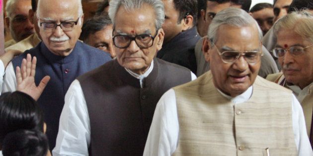 Indian Vice President Bhairon Singh Shekhawat, center, flanked by Senior Bharatiya Janata Party (BJP) leaders Atal Bihari Vajpayee, front, and L.K. Advani, behind, returns after filing his nomination papers as the National Democratic Alliance-backed Independent candidate for the presidential election in New Delhi, India, Monday, June 25, 2007. Unfazed by the numbers against him, Shekhawat Monday filed his nomination papers for probably a straight fight with ruling United Progressive Alliance-Left nominee Pratibha Patil according to a news agency.To the extreme right is senior BJP leader Murali Manohar Joshi.(AP Photo/Gurinder Osan)