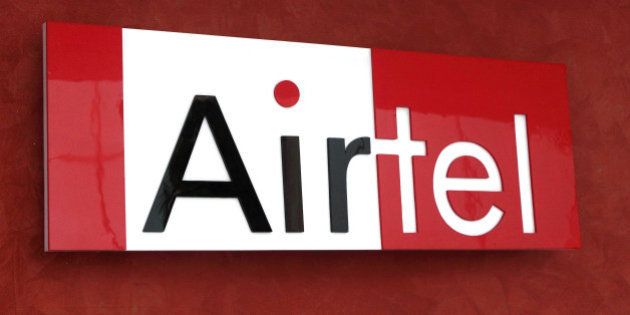 The Bharti Airtel Ltd. logo is displayed at the company's office in Gurgaon, India, on Thursday, Sept. 16, 2010. Bharti Airtel Ltd. is in talks with other Indian mobile operators to form an alliance to offer third-generation services nationwide. Photographer: Pankaj Nangia/Bloomberg via Getty Images