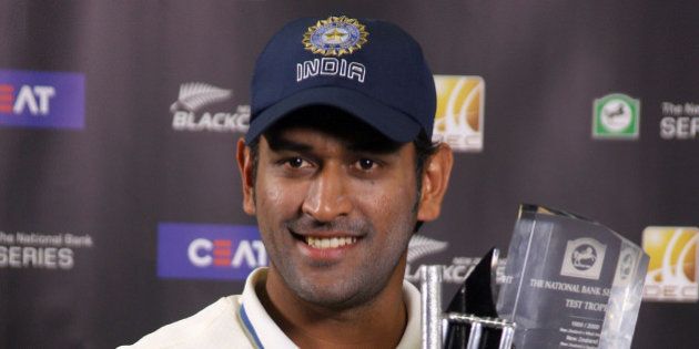 WELLINGTON, NEW ZEALAND - APRIL 07: MS Dhoni of India holds the series trophy after day five of the Third Test match between New Zealand and India at the Basin Reserve on April 7, 2009 in Wellington, New Zealand. (Photo by Marty Melville/Getty Images)