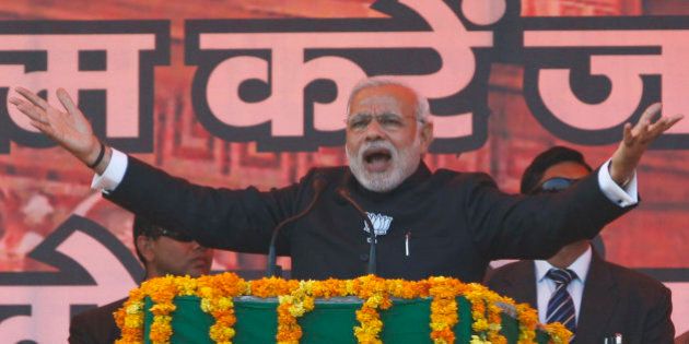 Indian Prime Minister Narendra Modi addresses an election campaign rally in Jammu, India, Tuesday, Dec. 16, 2014. The final phase of the five-phased state elections of Jammu and Kashmir will be held on Dec. 20. (AP Photo/Channi Anand)