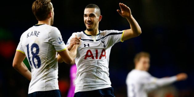 LONDON, ENGLAND - JANUARY 01: Harry Kane of Spurs celebrates victory with team-mate Nabil Bentaleb after the Barclays Premier League match between Tottenham Hotspur and Chelsea at White Hart Lane on January 1, 2015 in London, England. (Photo by Clive Rose/Getty Images)