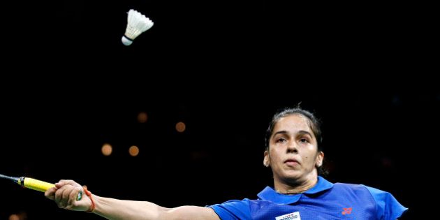 India's Saina Nehwal returns a shot to China's top seeded Li Xuerui, not seen, during their Quarter Final match at the World Badminton Championships at Ballerup Arena, Denmark, Friday, Aug. 29, 2014. (AP Photo/Jens Dresling, POLFOTO) DENMARK OUT