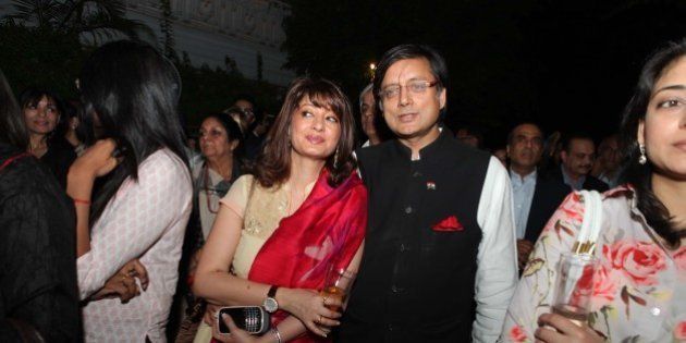 NEW DELHI, INDIA - APRIL 30 : Congress MP Shashi Tharoor with his wife Sunanda Pushkar Tharoor attend the book launch of writer columnist Aashti Bhartia's first book 'Vote of Confidence' at Olive Beach, Hotel Diplomat on April 30, 2012 in New Delhi, India. The book talks about the young Indian Politicians being the future of the country. ( Photo by Manoj Verma/ Hindustan Times via Getty Images)