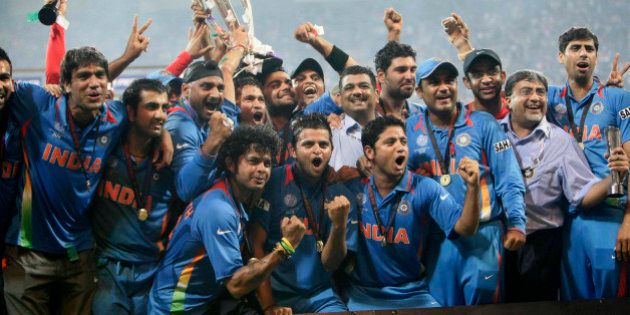 MUMBAI, INDIA - APRIL 02: Indian cricketers pose with the trophy after victory in the Cricket World Cup 2011 final over Sri Lanka at The Wankhede Stadium in Mumbai on April 2, 2011. India beat Sri Lanka by six wickets. (Photo by Naveen Jora/India Today Group/Getty Images)