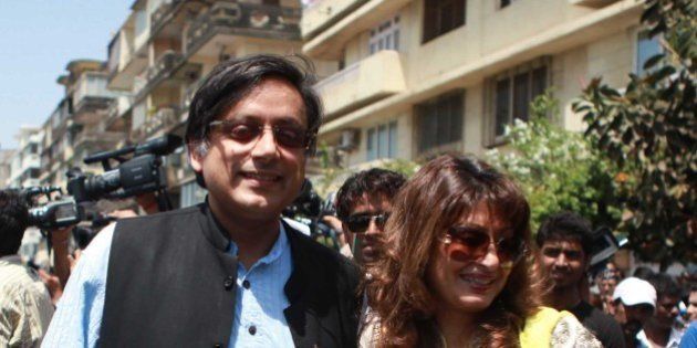 MUMBAI, INDIA - APRIL 2: (File photo) Indian politician Shashi Tharoor with his wife Sunanda Pushkar Tharoor outside Wankhede Stadium, while entering to watch ICC cricket World cup Final match between India and Srilanka on April 2, 2011 in Mumbai, India. Sunanda Pushkar, the 52-year-old industrialist wife of Union HRD minister Shashi Tharoor was found dead on Friday at a seven-star hotel where the couple had checked in together a day earlier, the police said. News of her death emerged late in the evening, coming within two days of her Twitter spat with a Pakistani journalist, Mehr Tarar, over an alleged affair with the minister. Pushkar, who has business interests in Dubai and was the Congress ministerâs third wife, was found dead in the bedroom of The Leela Palace suite number 345 around 8.15pm. Mehr Tarar, a columnist with Pakistanâs Daily Times, reacted to the news of Pushkarâs death in two consecutive tweets: What the hell. Sunanda. Oh my God and I just woke up and read this. Im absolutely shocked. This is too awful for words. So tragic I dont know what to say. Rest in peace, Sunanda. (Photo by Hemant Padalkar/Hindustan Times via Getty Images)