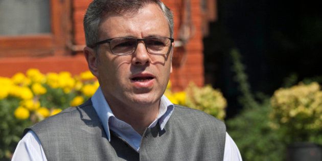 Jammu and Kashmir state Chief Minister Omar Abdullah addresses a press conference in Srinagar, India, Thursday, Sept. 26, 2013. Abdullah condemned the recent attack by suspected separatist rebels in the Indian portion of Kashmir Thursday. Suspected separatist rebels stormed into a police station and shot and killed at least four police officers and two civilians before attacking a nearby army camp, police said. (AP Photo/Dar Yasin)