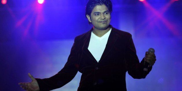 Indian Bollywood playback singer Ankit Tiwari performs during the 'Ticket to Bollywood' fashion show in Mumbai on late July 19, 2014. AFP PHOTO/STR (Photo credit should read STRDEL/AFP/Getty Images)