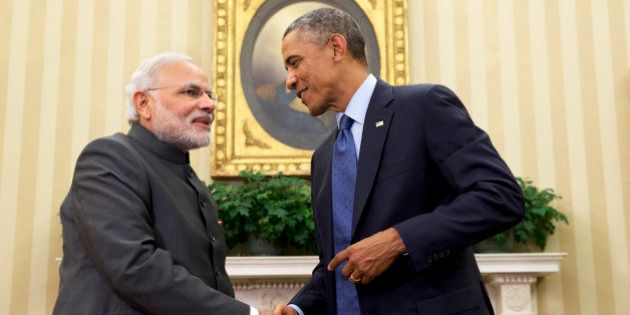 President Barack Obama shakes hands with Indian Prime Minister Narendra Modi, Tuesday, Sept. 30, 2014, in the Oval Office Â of the White House in Washington. President Barack Obama and India's new Prime Minister Narendra Modi said Tuesday that