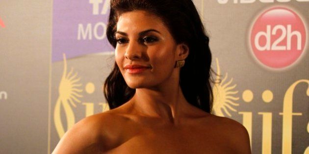 Bollywood actress Jacqueline Fernandez arrives for the International Indian Film Academy (IIFA) awards in Macau, Saturday, July 6, 2013. (AP Photo/Kin Cheung)