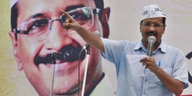 NEW DELHI, INDIA - JULY 31: Aam Aadmi Party leader Arvind Kejriwal addressing a rally of auto drivers at the Ramlila Maidan on July 31, 2014 in New Delhi, India. In efforts to woo its traditional support base ahead of possible assembly elections in Delhi, Aam Aadmi Party come in support grievances of auto drivers and promised to solve them if his party returns to power. (Photo by Raj K Raj/Hindustan Times via Getty Images)